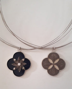 Exhibition necklaces, sixpence cutouts