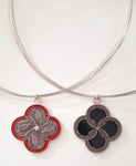 Exhibition necklaces, sixpence cutouts