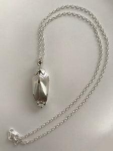 Silver bud on a sterling chain. Not for sale.