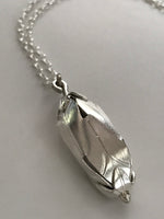 Silver bud on a sterling chain. Not for sale.