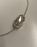 Silver bud on a sterling chain. Not for sale.